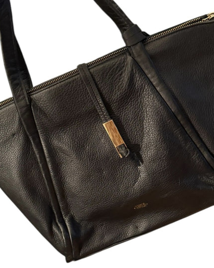 Lovely Vince Camuto Black Leather Tote Bag with gold accents