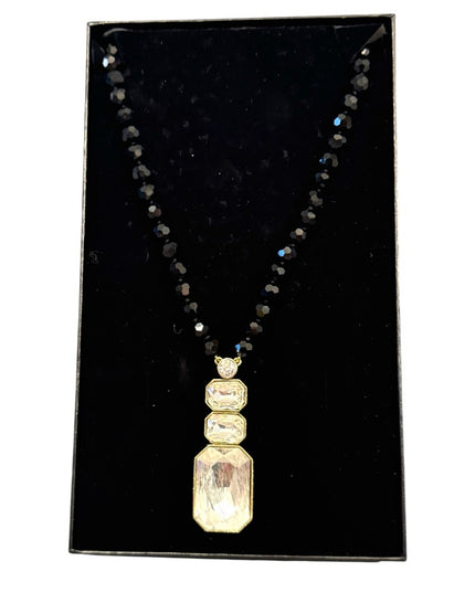 Elegant HEIDI DAUS
Ice Single Strand Pendant Necklace Black and Gold Necklace