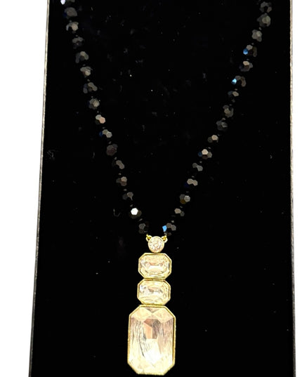 Elegant HEIDI DAUS
Ice Single Strand Pendant Necklace Black and Gold Necklace