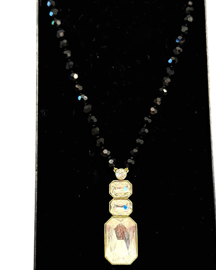 Elegant HEIDI DAUS
Ice Single Strand Pendant Necklace Black and Gold Necklace