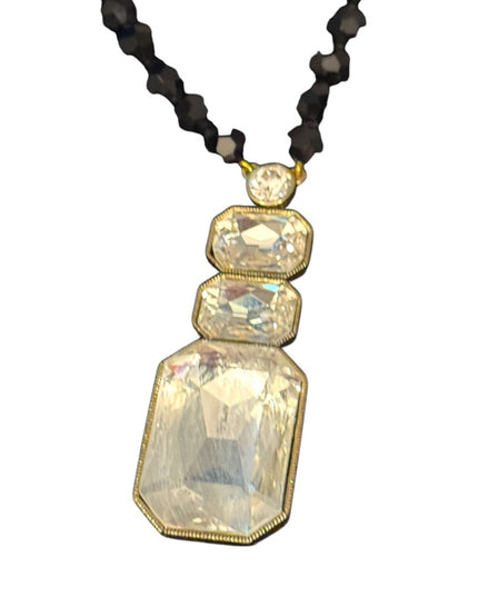 Elegant HEIDI DAUS
Ice Single Strand Pendant Necklace Black and Gold Necklace