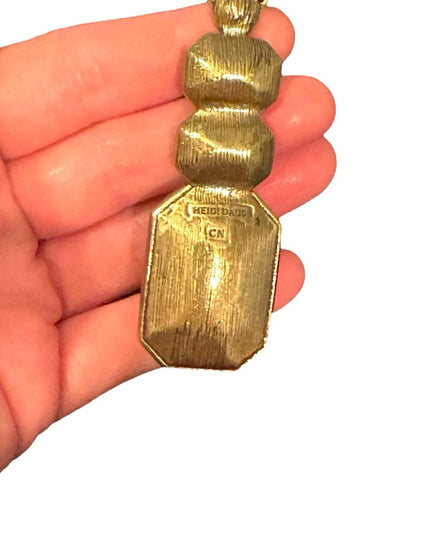 Elegant HEIDI DAUS
Ice Single Strand Pendant Necklace Black and Gold Necklace