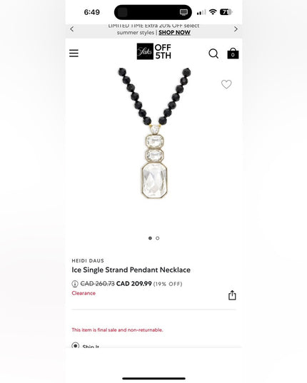 Elegant HEIDI DAUS
Ice Single Strand Pendant Necklace Black and Gold Necklace