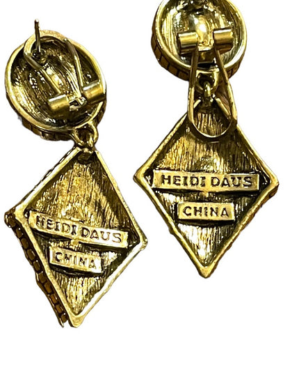 Retired Heidi Daus antiqued brassy finish peridot green & clear crystal …