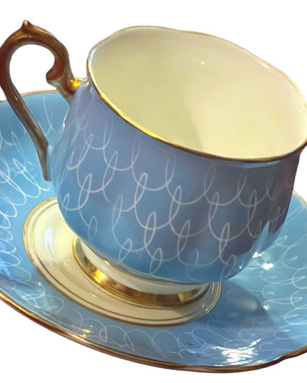 Vintage Royal Albert blue tea cup and saucer 1950s swirl bone china England