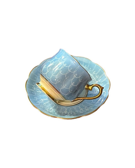 Vintage Royal Albert blue tea cup and saucer 1950s swirl bone china England