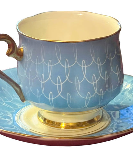 Vintage Royal Albert blue tea cup and saucer 1950s swirl bone china England