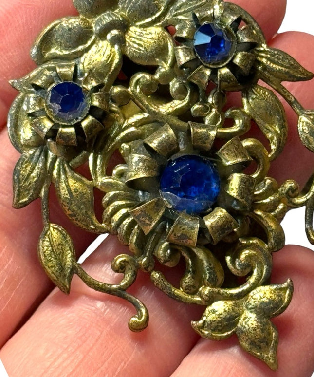 Antique brassy blue crystal flower antiqued fur clip