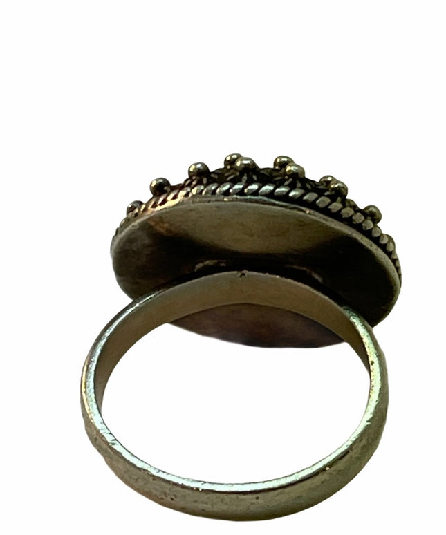 Sterling silver antiqued round flower fancy ring
