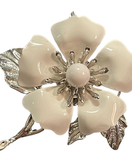Vintage 1970s Sarah Coventry white enameled flower silver finish brooch