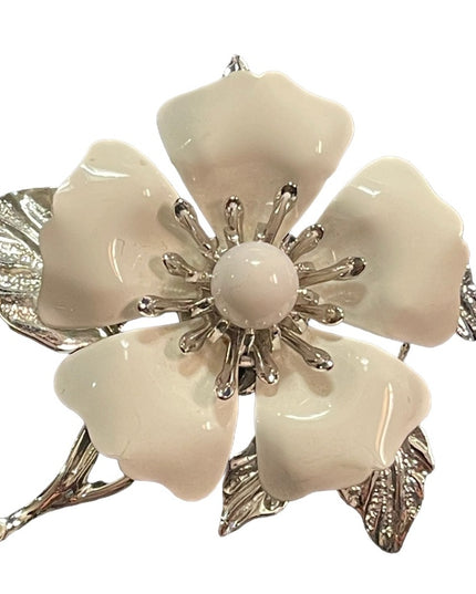 Vintage 1970s Sarah Coventry white enameled flower silver finish brooch
